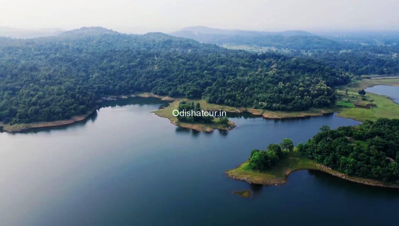 aerial view of lake in odisha surrounded by mountain